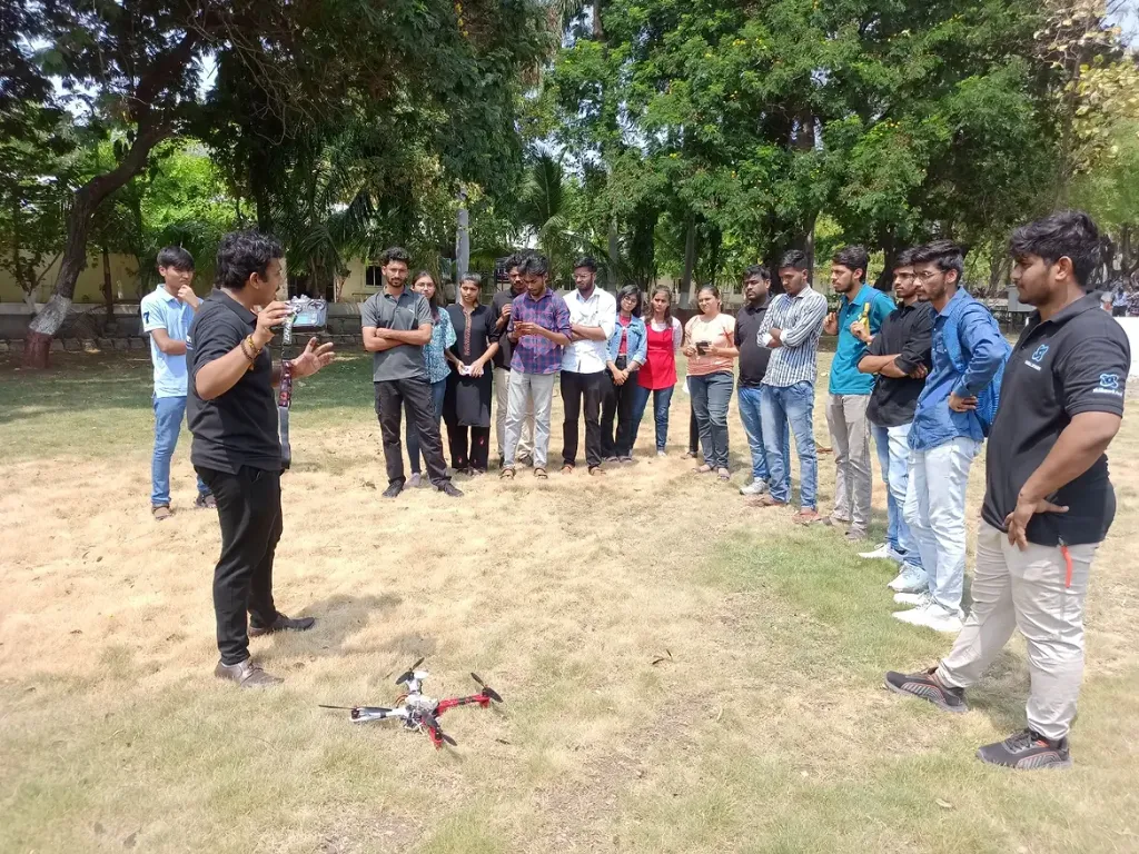 Drone flight demonstration in an open grassy field